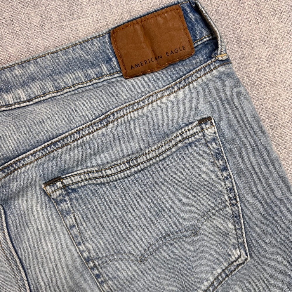 American Eagle Outfitters Light Blue Bootcut Jeans with Brown Patch 32x32
